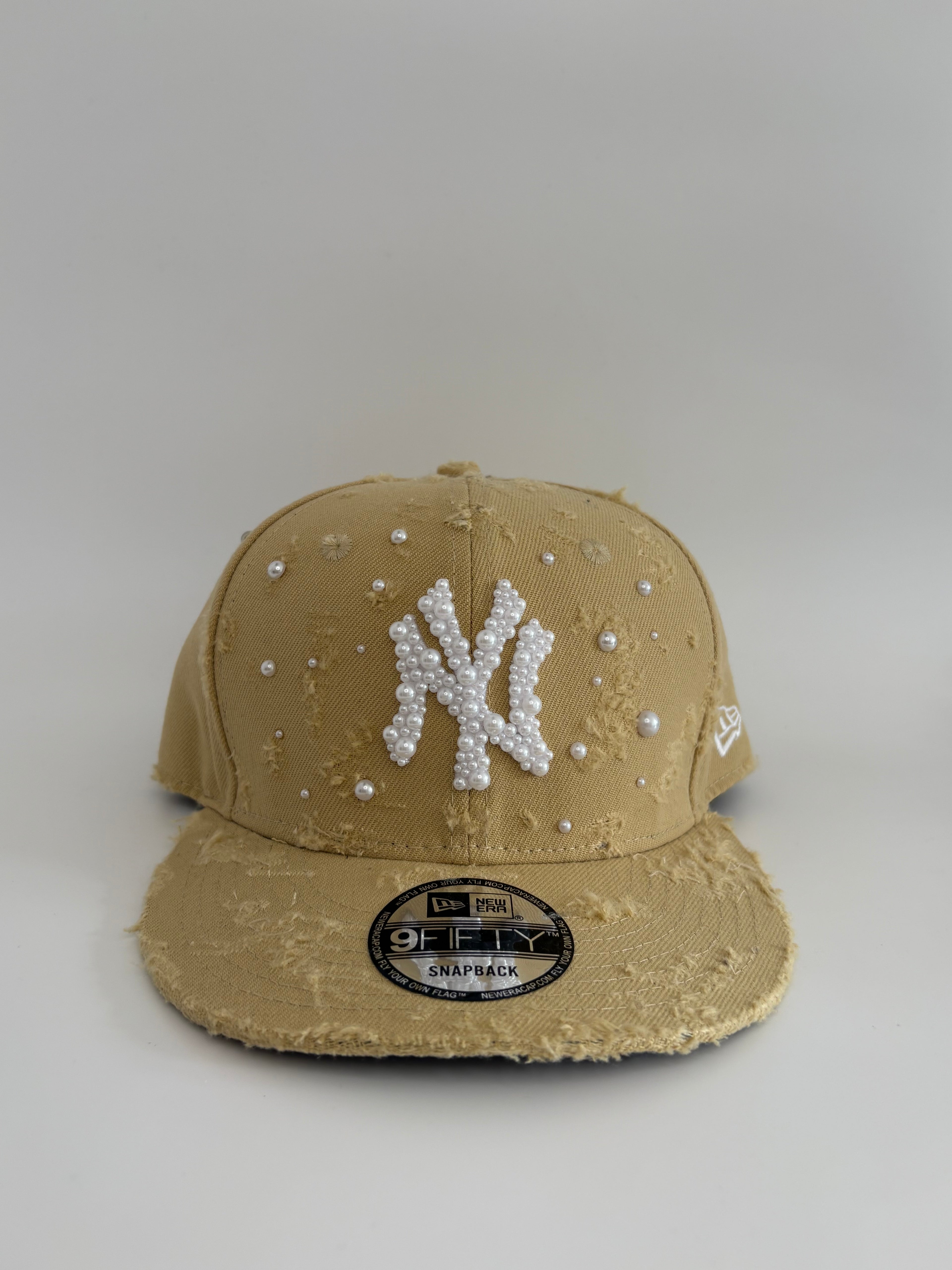 Unique cap with a cross