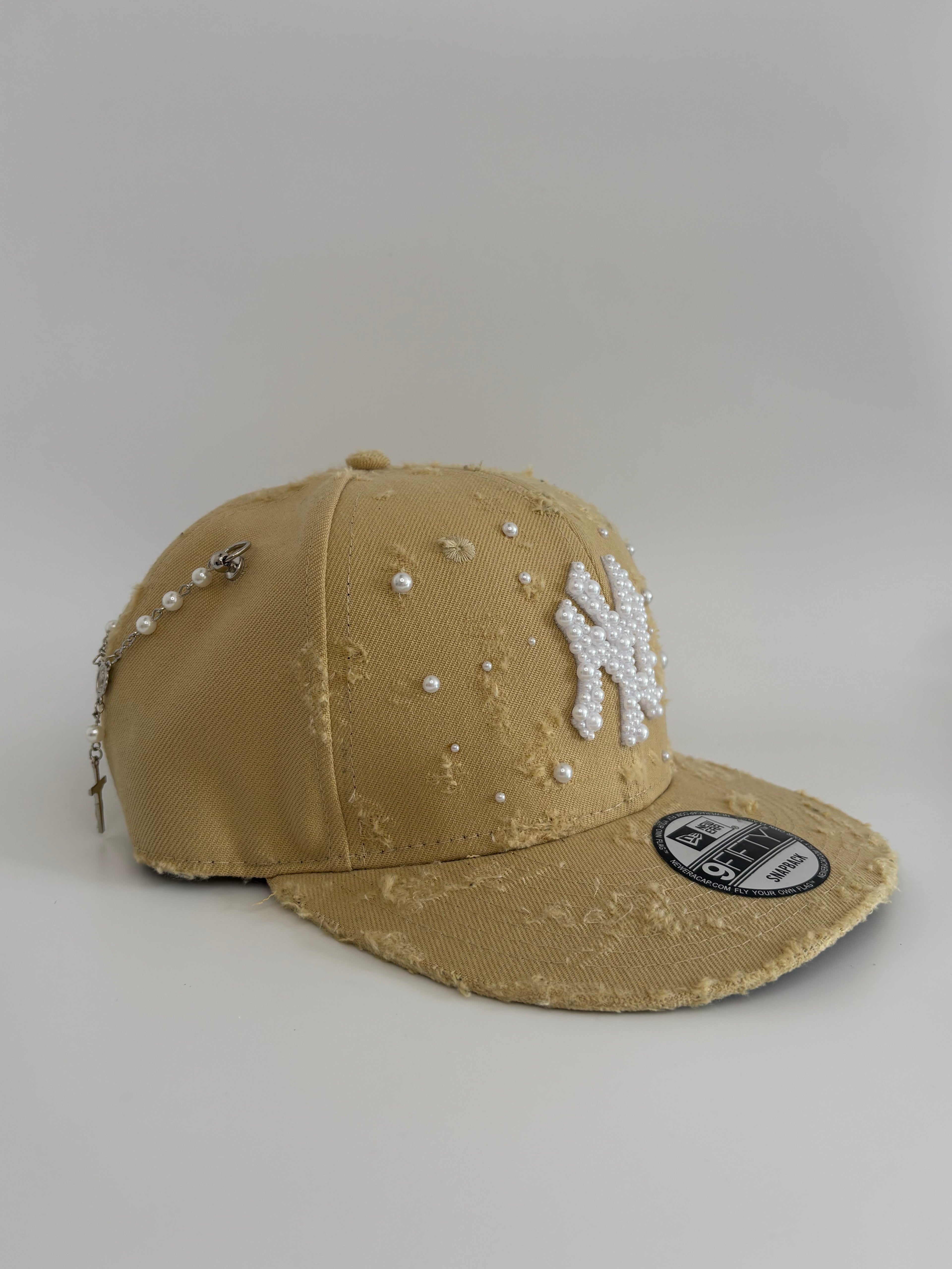 Unique cap with a cross