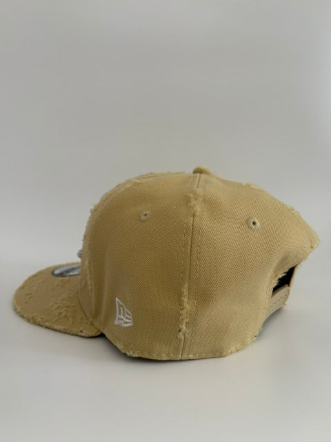 Unique cap with a cross