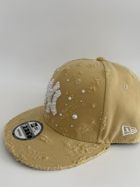Unique cap with a cross